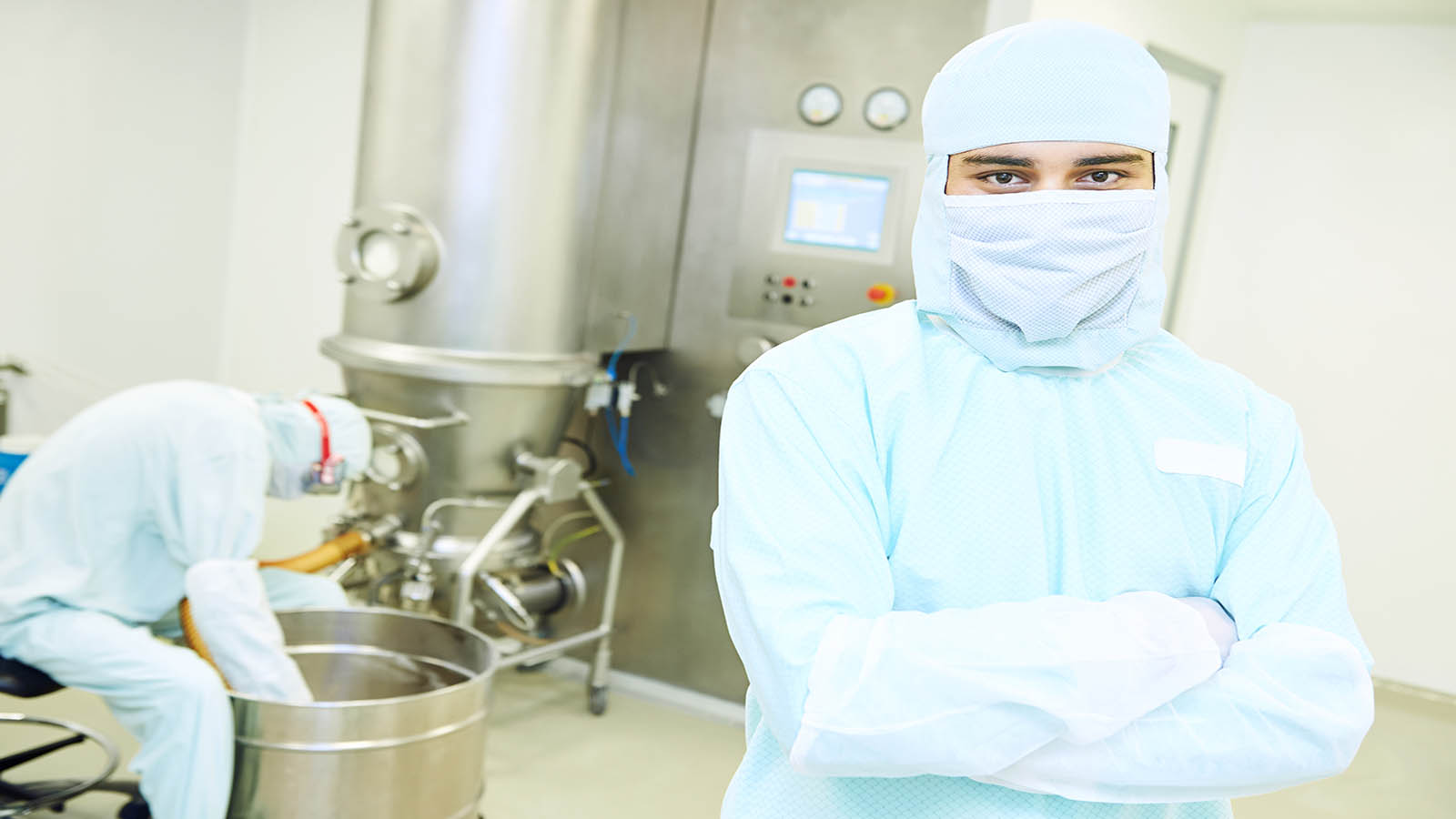 Portrait,Of,Pharmaceutical,Factory,Worker,In,Protective,Suit